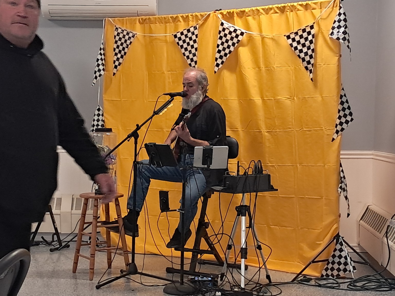 Trevor Knowles performing on stage